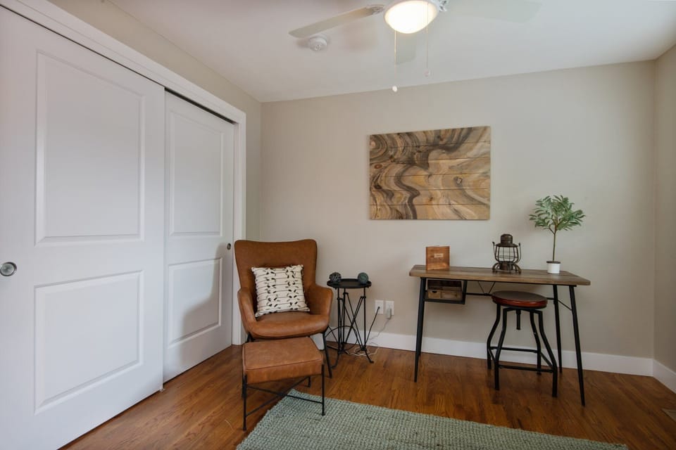 Work or relax in the private lounge area, complete with a comfortable chair and a desk for those who WFH.