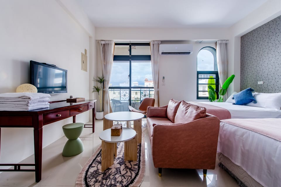 Deluxe Quadruple Room, Balcony | Free WiFi, bed sheets