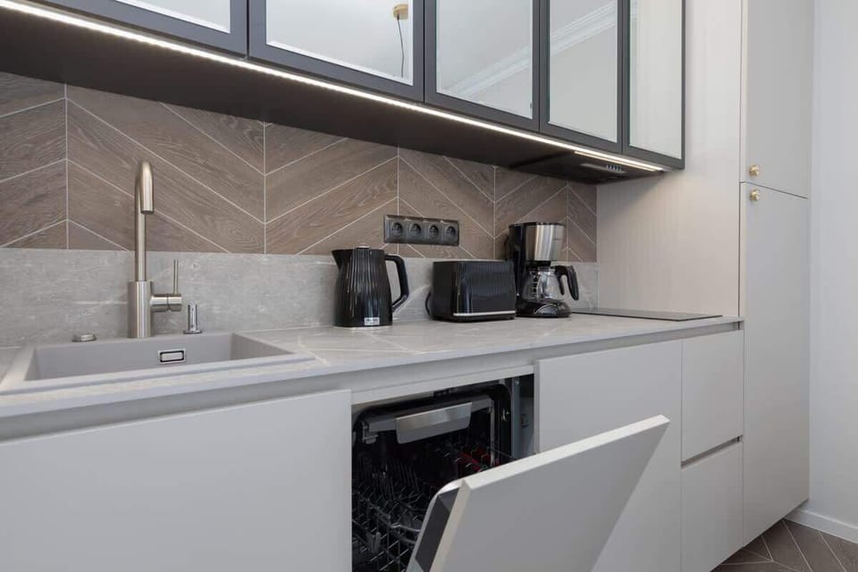 The dishwasher that ensures easy cleanup after meals.