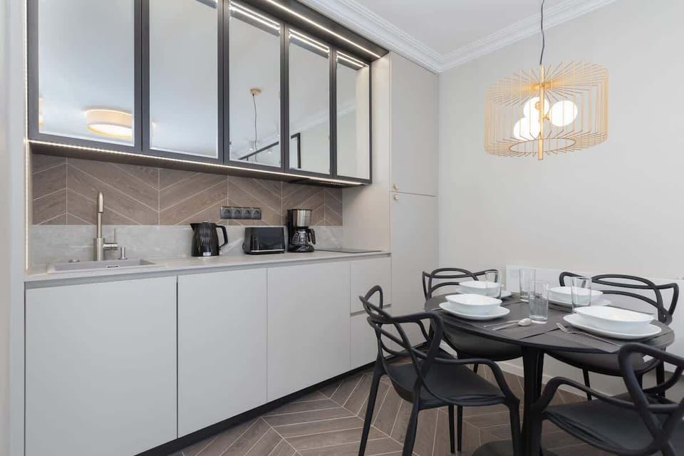The fully equipped kitchenette includes everything you need for a home-cooked meal.