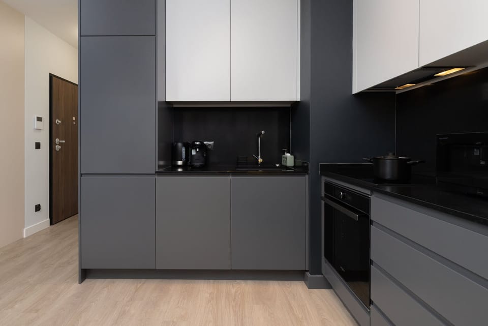 The kitchenette's practical layout maximizes space and functionality.