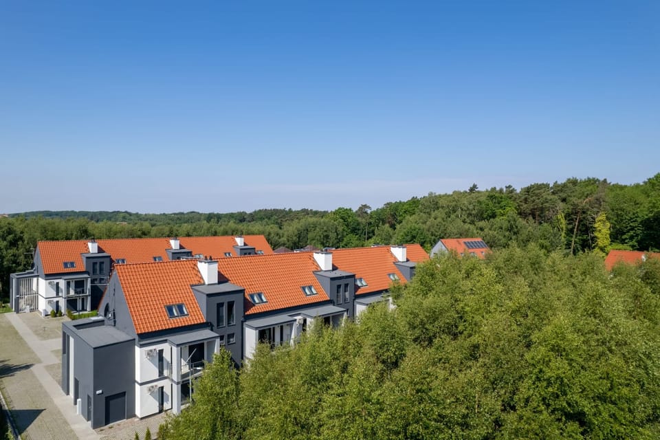 The building is close to charming beach.