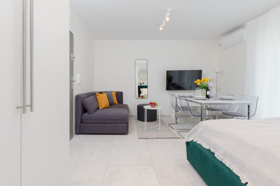 The living area's decor combines elegance with functionality. 
