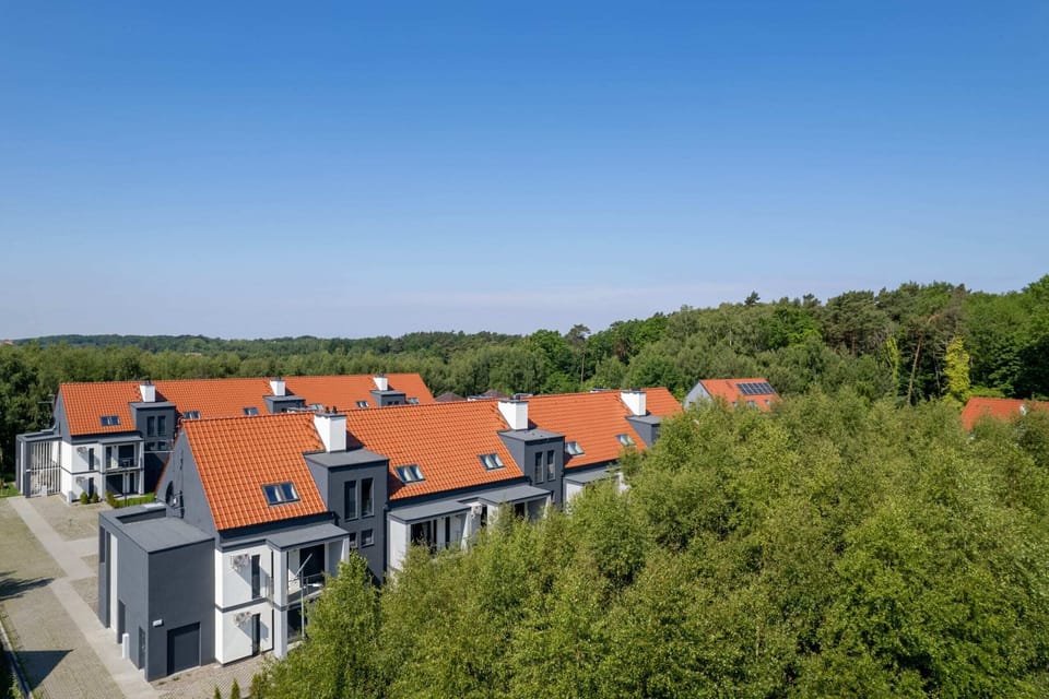 The building is close to charming beach.