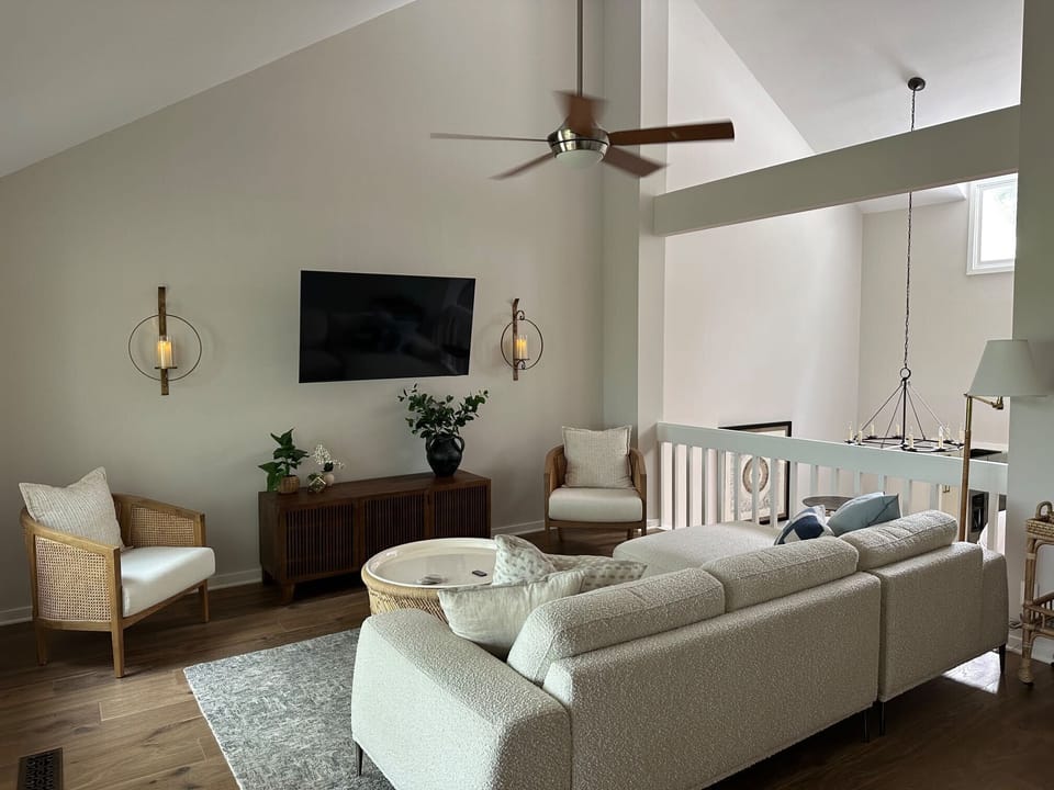 On the third floor soaring ceilings showcase the main living area.