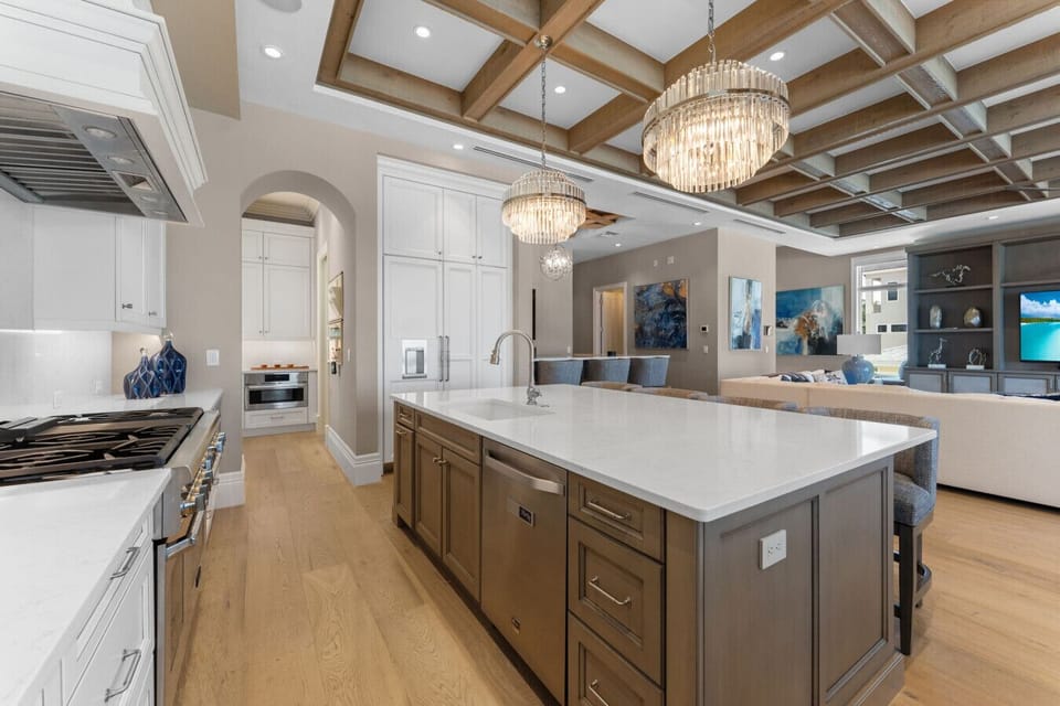 Chat, cook, and connect in this stylish, open-concept gathering spot.