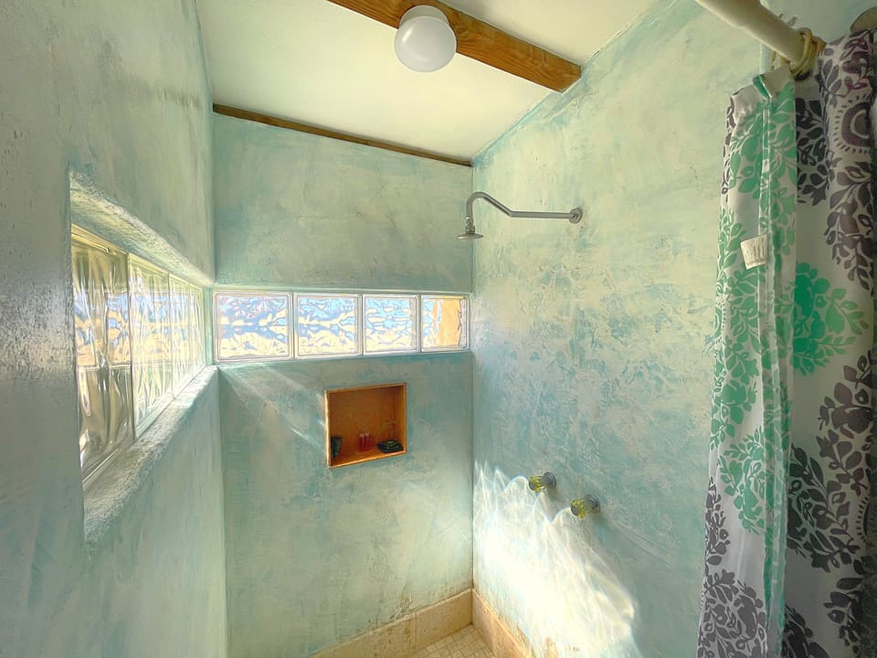Deluxe Room, 2 Bedrooms, Patio, Ocean View | Bathroom | Shower, rainfall showerhead, towels, soap