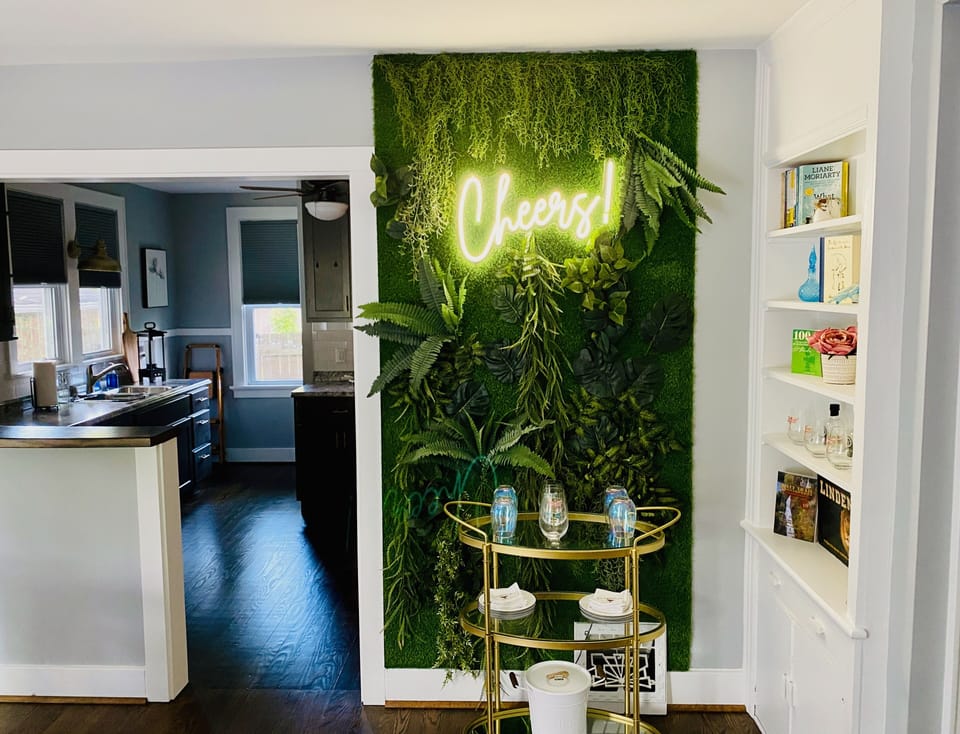 Enjoy photos in front of the Lion House enhanced signature wall!