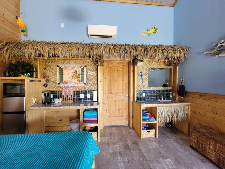 Coffee bar, microwave, & mini fridge.