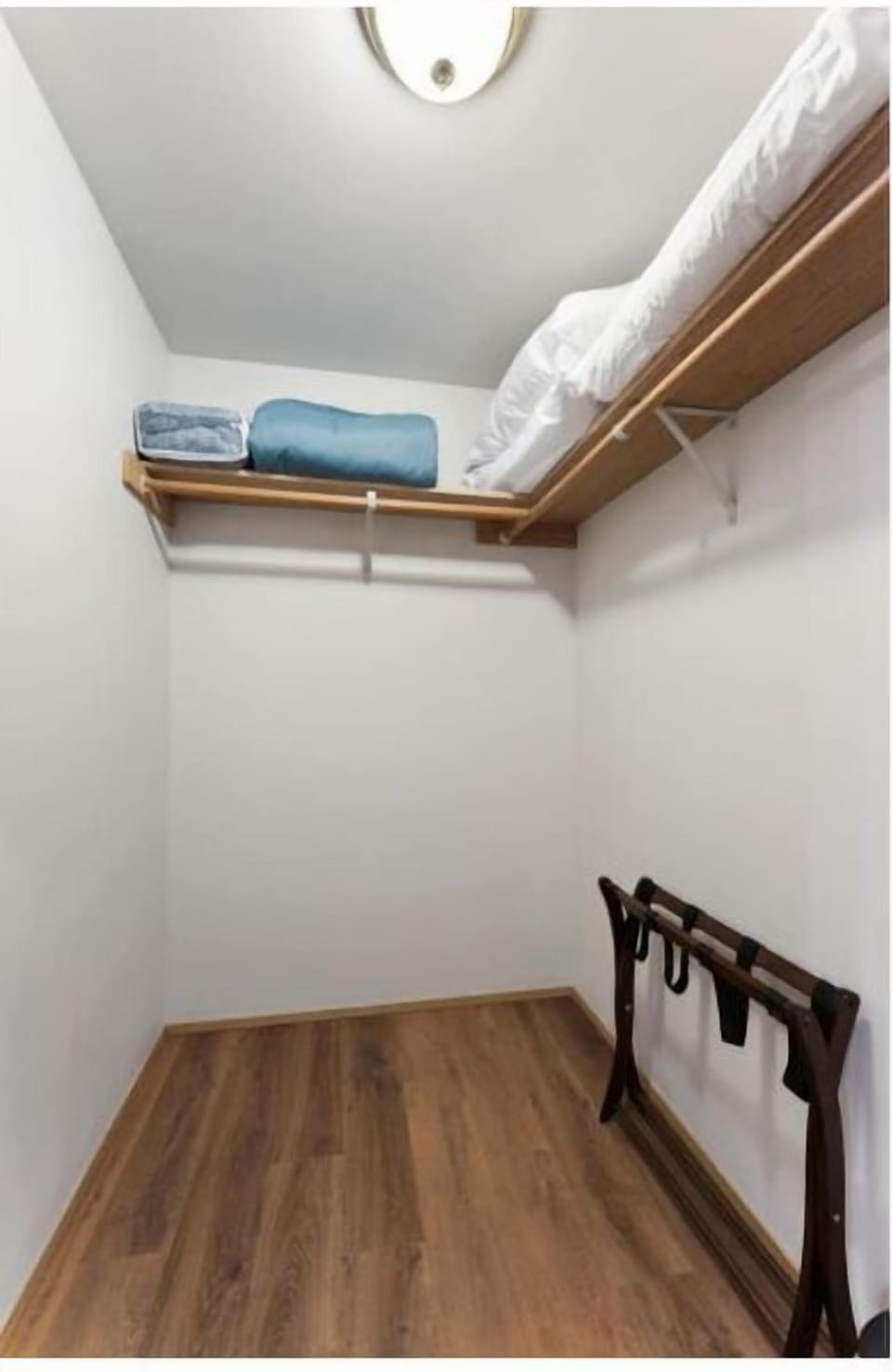 Walk in closet in the Master Bedroom - extra blankets and pillows