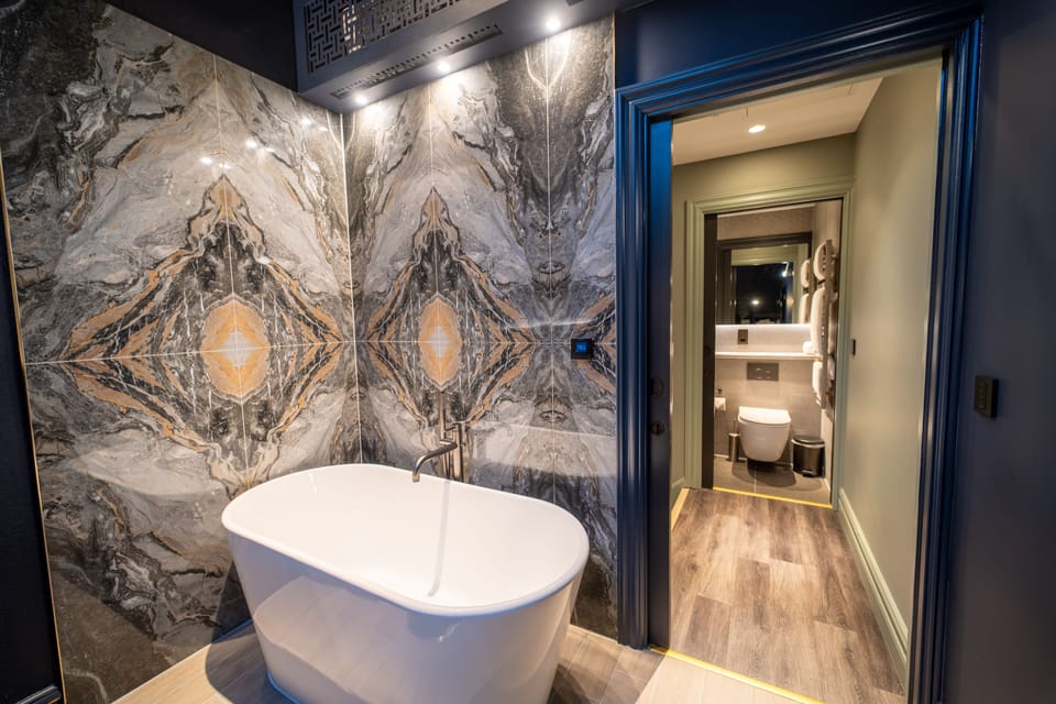 Signature Duplex | Bathroom | Shower, rainfall showerhead, designer toiletries, hair dryer