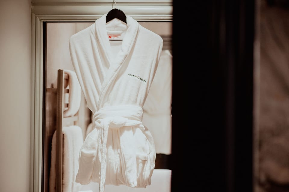 Shower, rainfall showerhead, designer toiletries, hair dryer