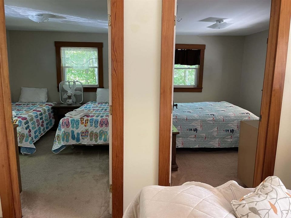 Bedrooms are both on the left side of cottage