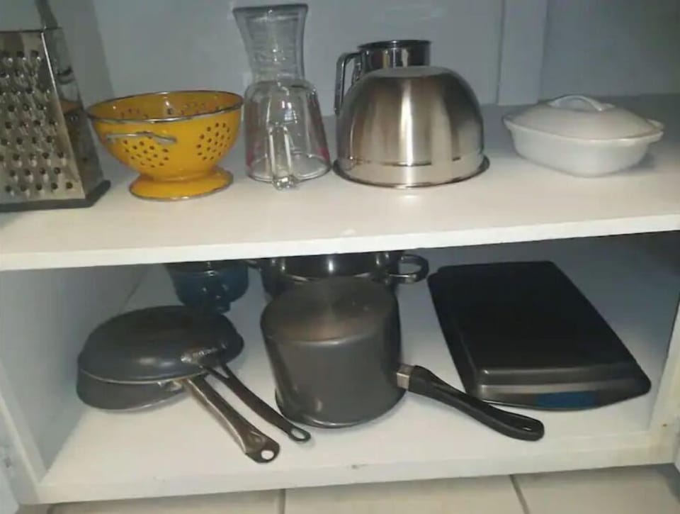 Pans, cheese grater, ceramic butter keeper, stainless steel bowel, vase, etc.