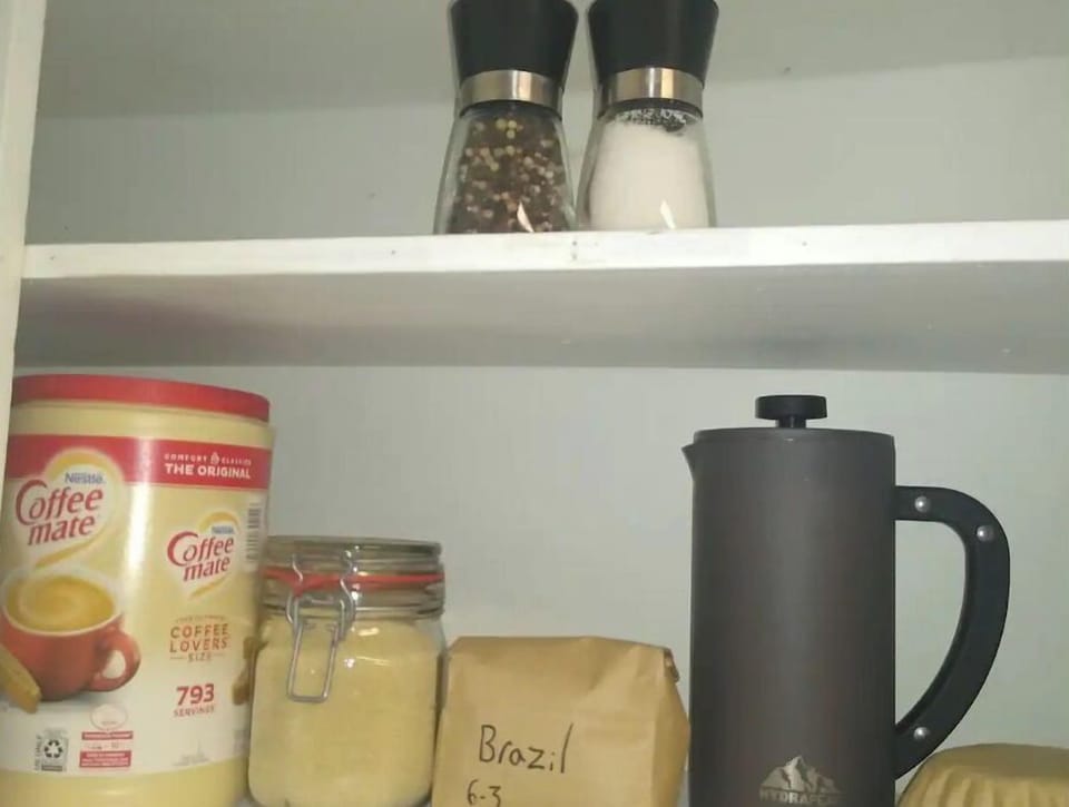 Salt, pepper, sugar, creamer, organic coffee beans (roasted in town), filters.