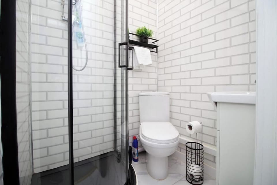 Our bathroom is spotless, modern, and designed with your comfort in mind. It features a sleek shower with excellent water pressure—perfect for a refreshing start to your day or a relaxing rinse at night.