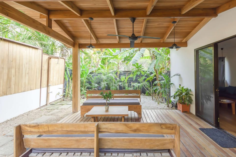 The roomy veranda is great as a seating area, or for yoga practice!