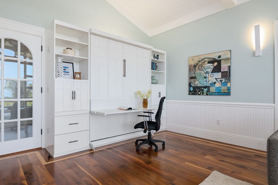 Desk in entertainment room is also a Murphy bed!