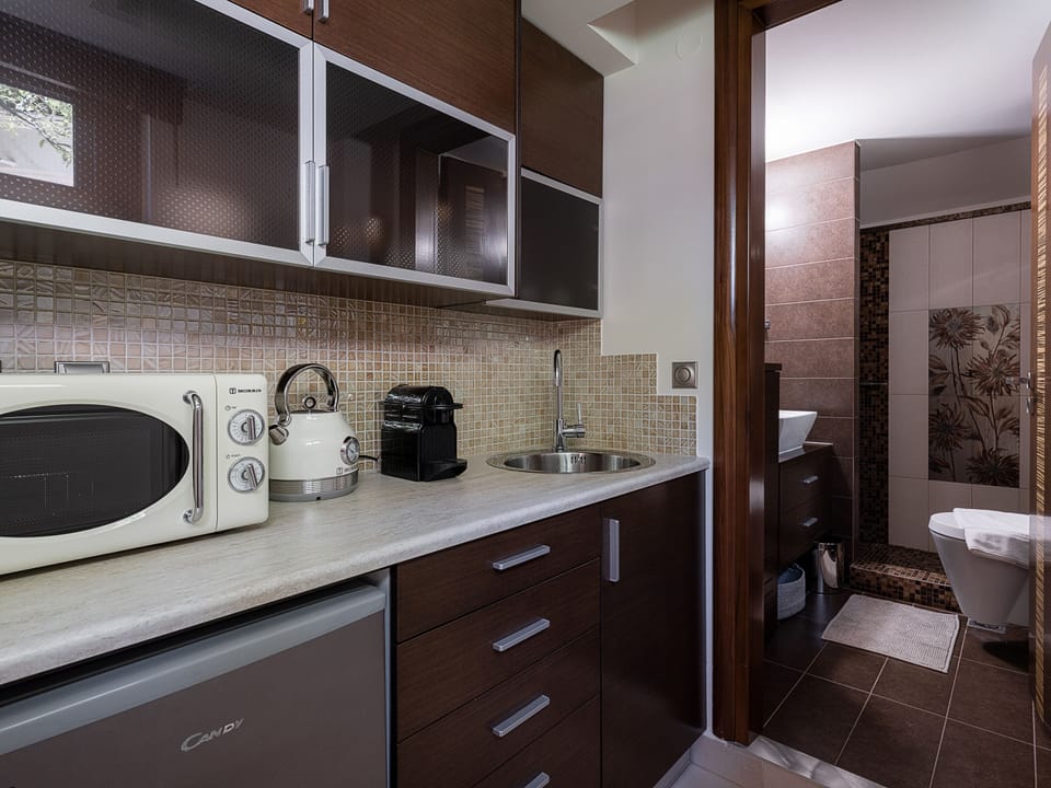 Villa | Private kitchen | Full-size fridge, microwave, stovetop, espresso maker