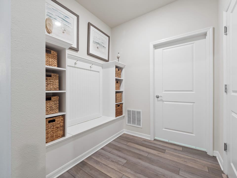 Cubby Area with Laundry Room Including Full Size Washer and Dryer