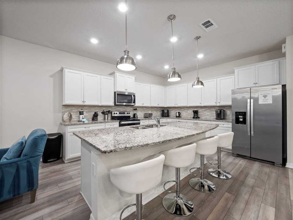Modern Full Size Kitchen with Bar Stool Seating for 4