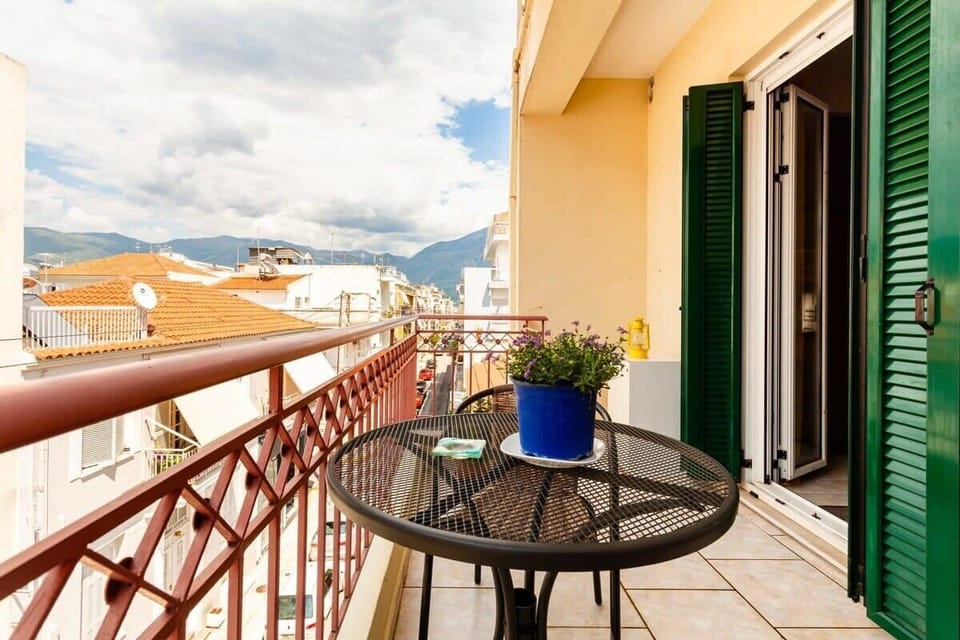 View from the Balcony of the Room – Private balcony overlooking the peaceful neighborhood.