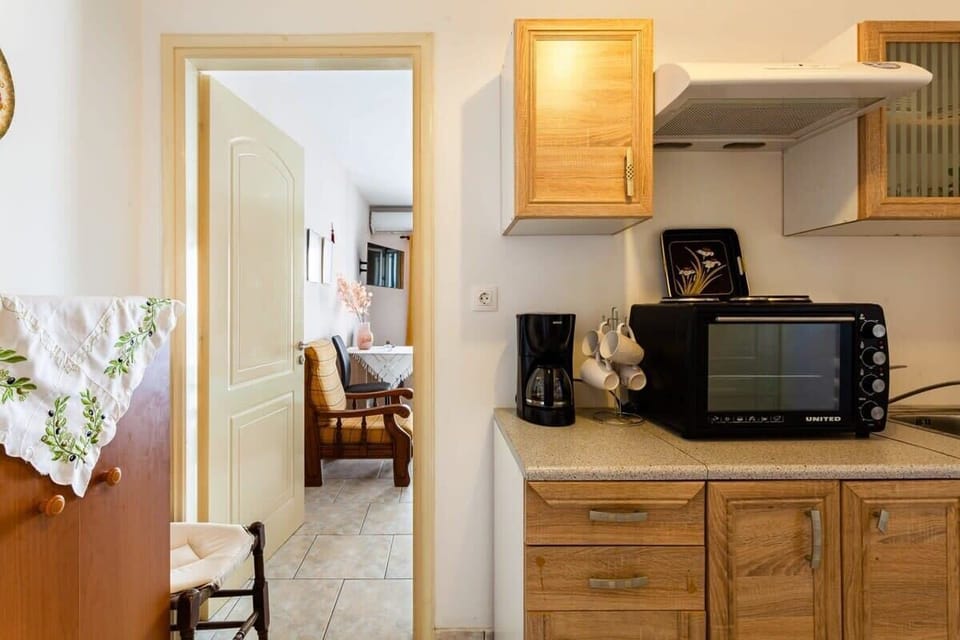 Focus on the Details – Clean lines and warm wood tones create a cozy, functional environment.