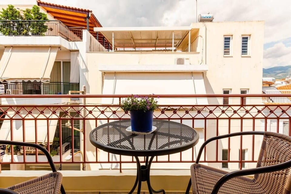 View of the Exterior – Peaceful street view from the balcony, ideal for quiet mornings.