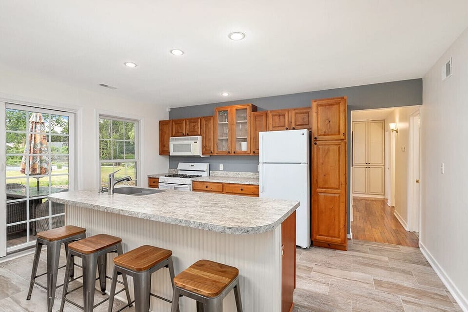 Oversized kitchen with Island seating for four.