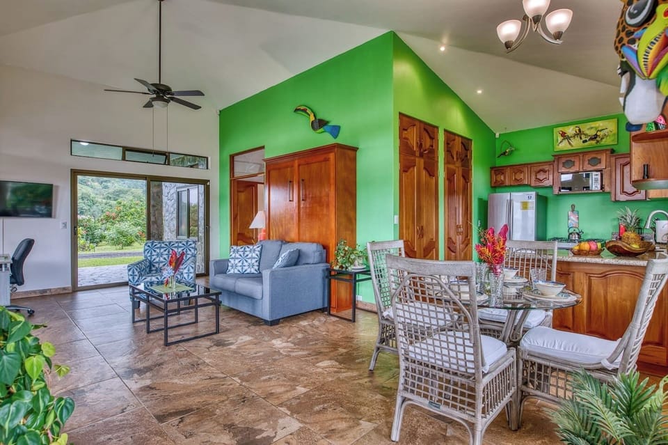 This open concept living/dining and Kitchen is bright and airy.  It's the perfect place to relax, and gaze out the front windows at the lake.    This home is affectionately named Casa Tucan.