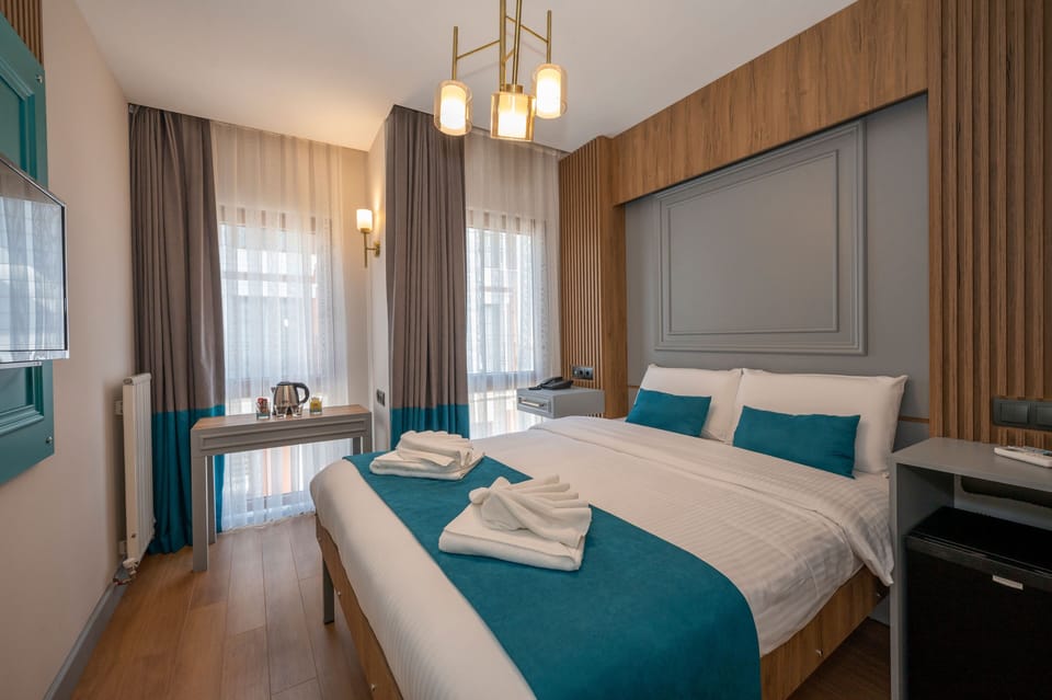 In-room safe, laptop workspace, soundproofing, iron/ironing board