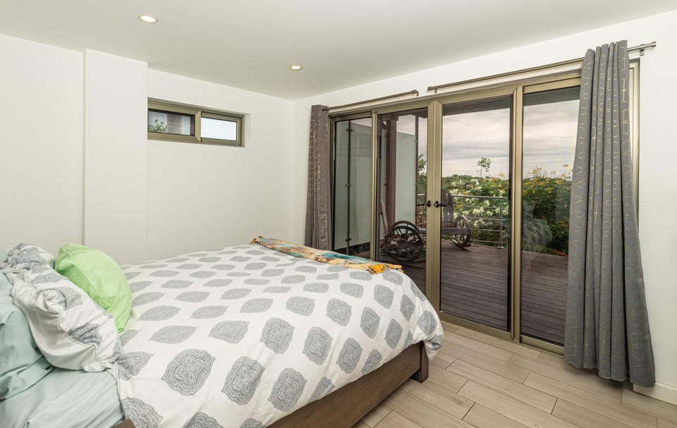 Cozy bedroom with garden views and natural light