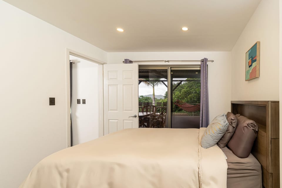 Cozy bedroom retreat with garden views and natural light