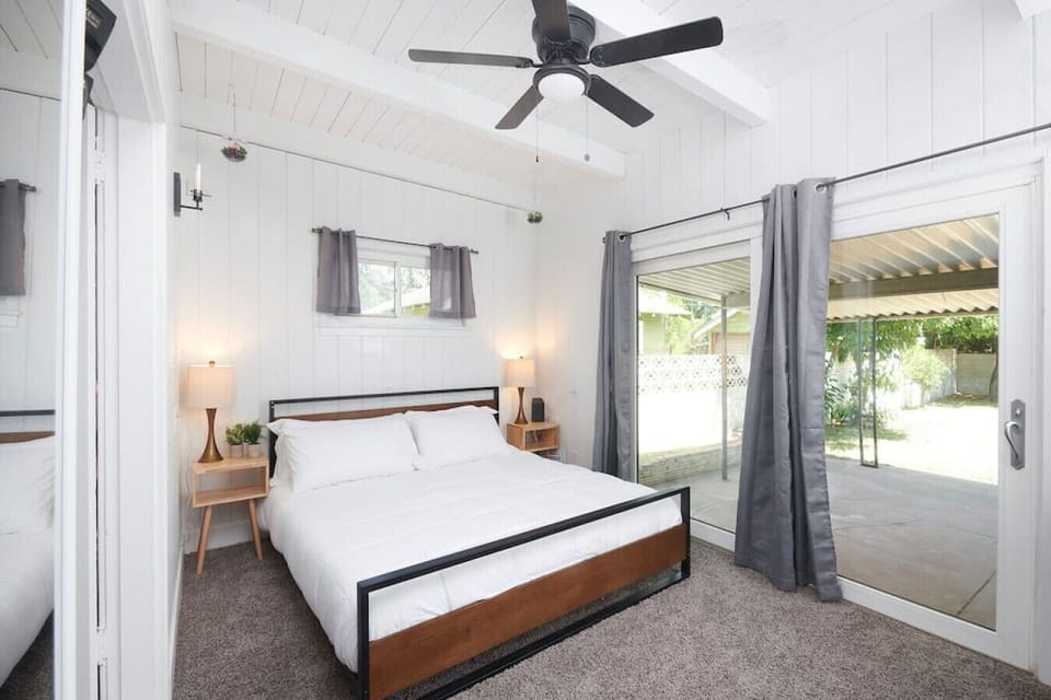 Bedroom 1- King Bed, and an outdoor view.