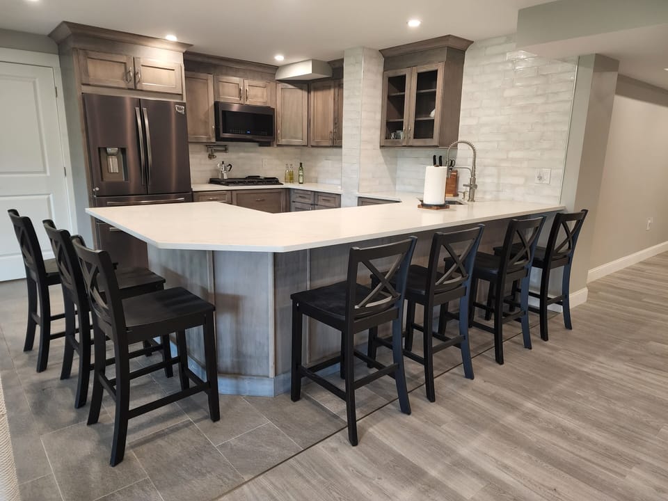 Basement has a full-bar kitchen