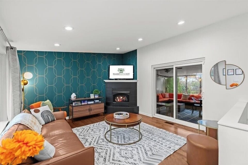 Cozy up by the gas fireplace and unwind in the inviting living room.