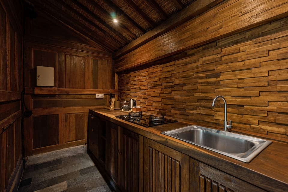 Villa | Private kitchen | Full-size fridge, microwave, stovetop, dishwasher