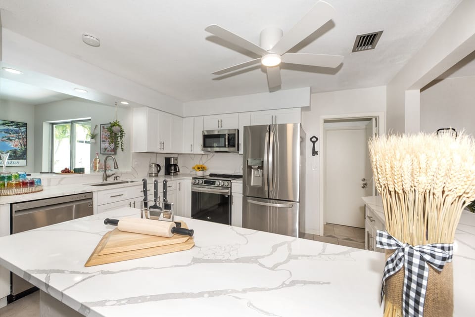 12+ cabinets, coffee maker, tea kettle, toaster, pots, pans, utensils, etc.