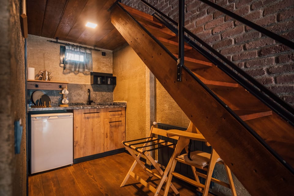Premium Bungalow | Private kitchenette | Mini-fridge, stovetop, electric kettle, highchair