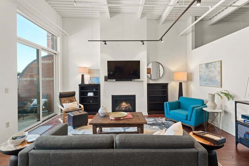 Spacious and professionally-decorated, open-concept living/dining/kitchen