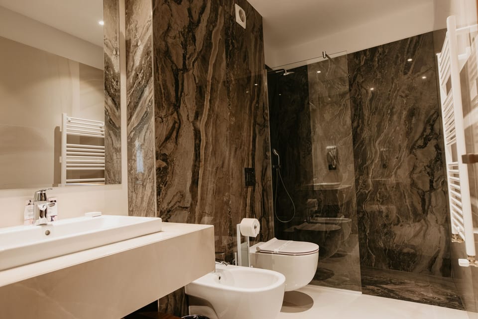 Shower, free toiletries, hair dryer, bathrobes
