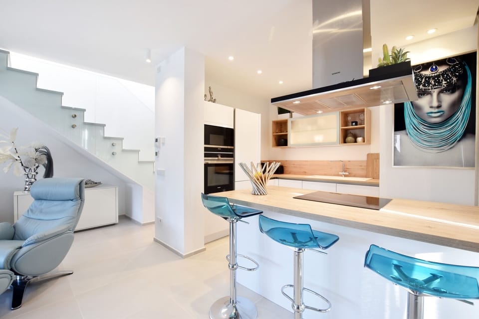 Fully equipped kitchen open to the living room