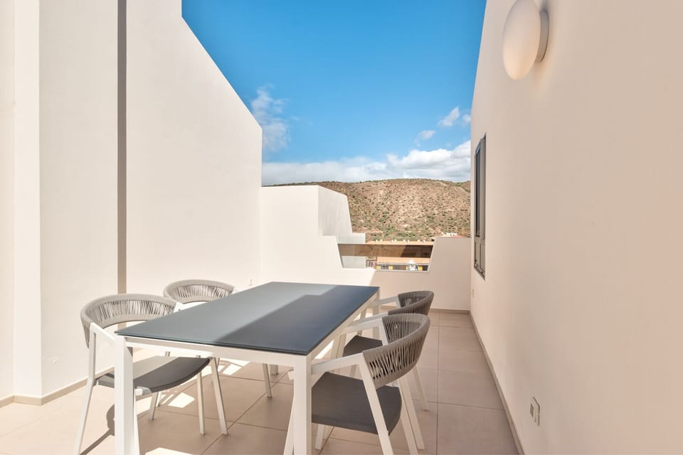 Dining table on rooftop terrace