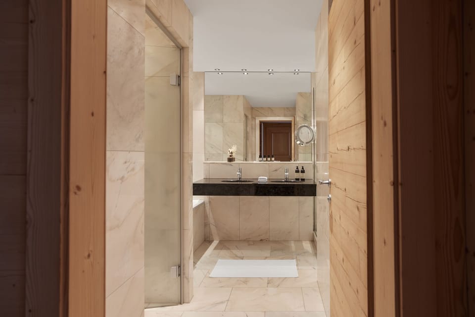 Designer toiletries, hair dryer, bathrobes, towels