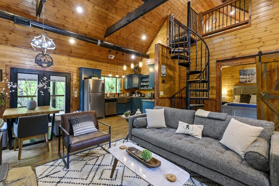 This Stylishly Updated Cabin Combines Timeless Warmth with Modern Functionality in One Flowing Space