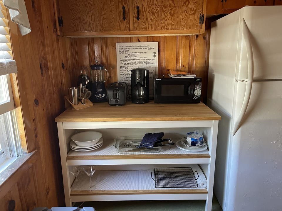 Amenities; drip coffee maker, blender, juicer, toaster, microwave, bar set etc 