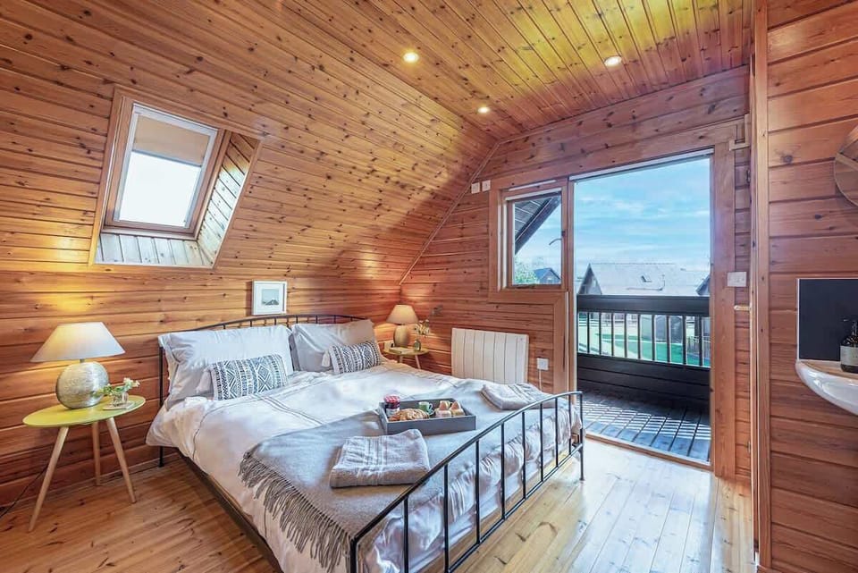 Spacious master bedroom with balcony