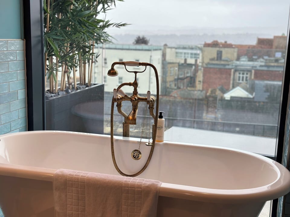 Designer toiletries, hair dryer, bathrobes, towels