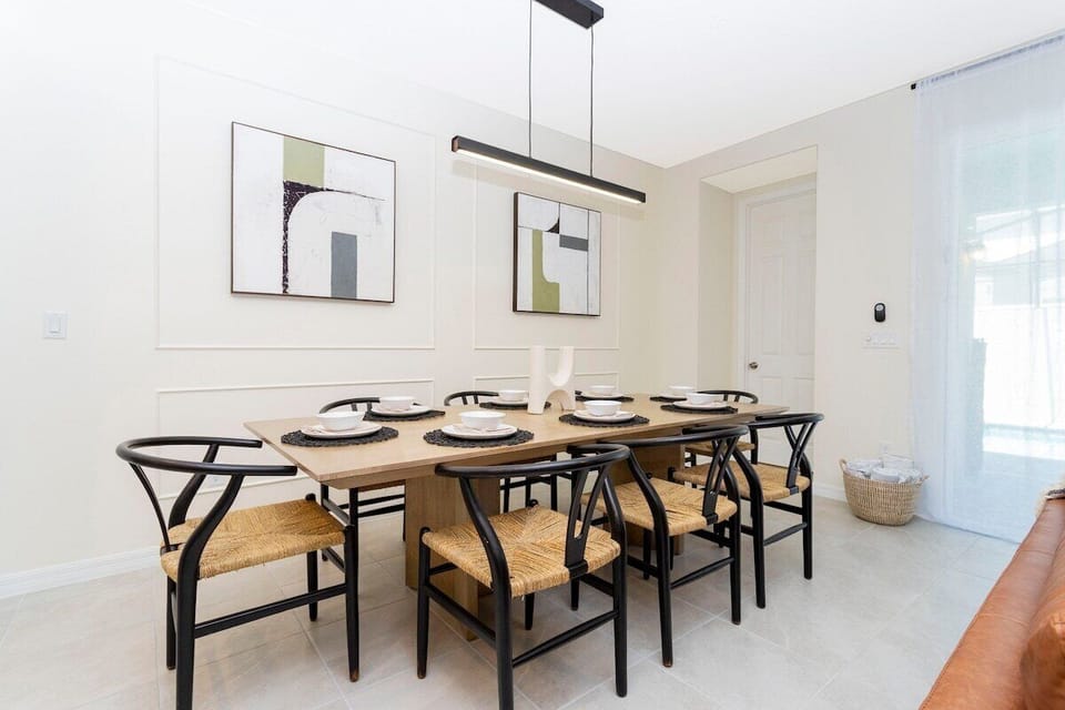 Gather around the dining table and enjoy memorable meals in this inviting space