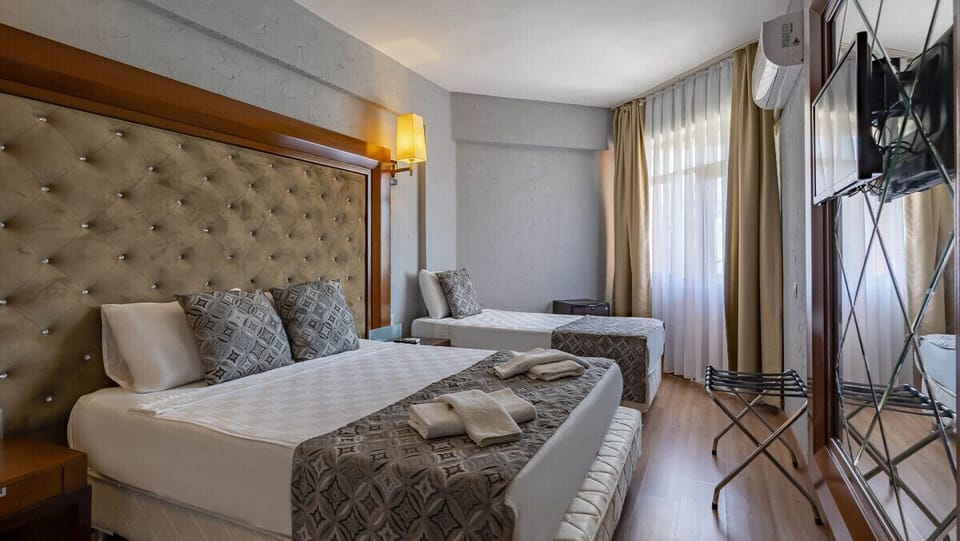 Premium bedding, blackout drapes, bed sheets